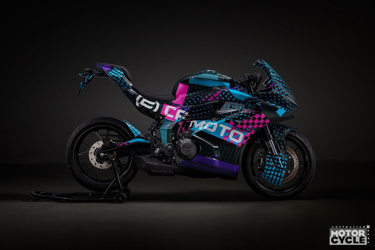 CFMoto 250SR-R prototype shown at CFMoto Day, camouflage wrap concealing final production details