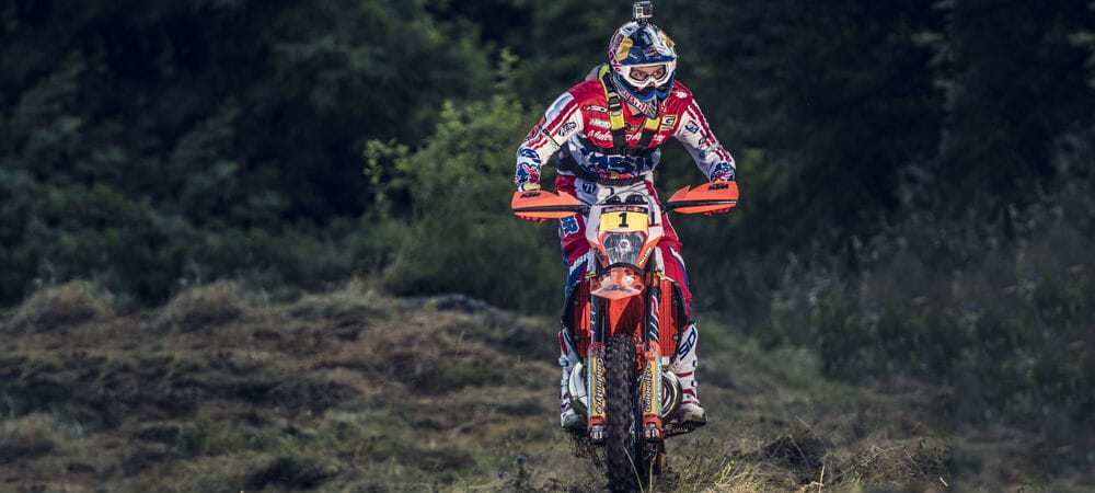 Competitors tackling a rock section at Red Bull Romaniacs