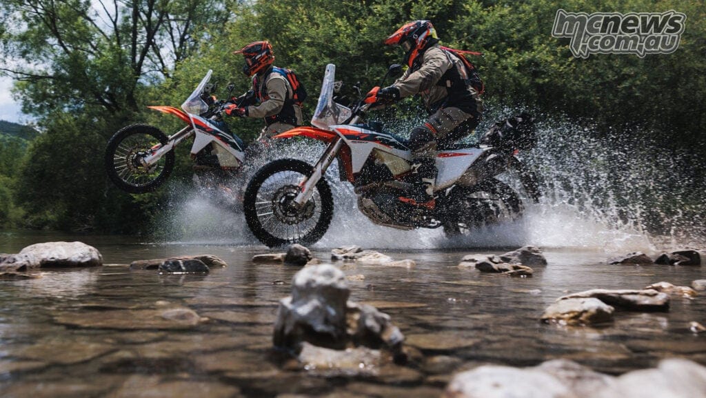 2027 KTM 690 Rally, side profile, showing the rally tower and front tank pods