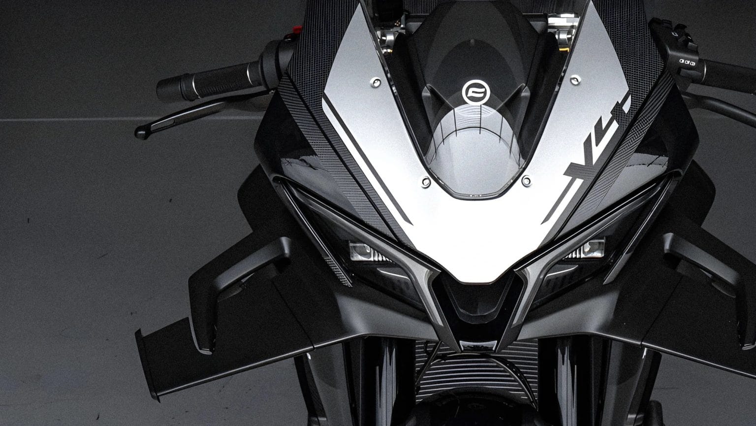 CFMoto V4SR-RR superbike prototype with rider mannequin inside Pininfarina's wind-tunnel testing chamber