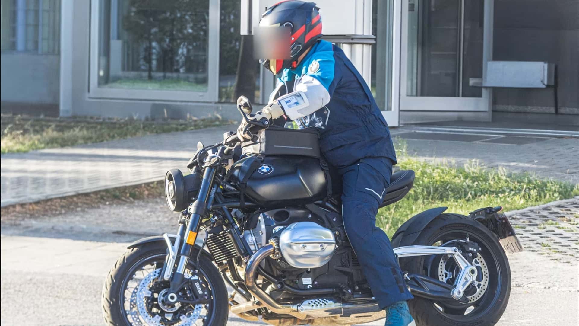 BMW R20 prototype during road testing, matte black tank, solo bobber-style seat and visible Paralever shaft drive