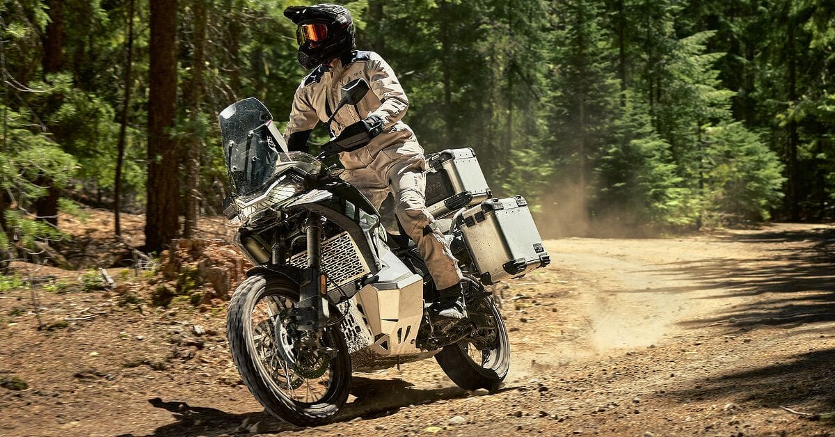 CFMoto Ibex 950 adventure motorcycle parked outdoors, front three-quarter angle