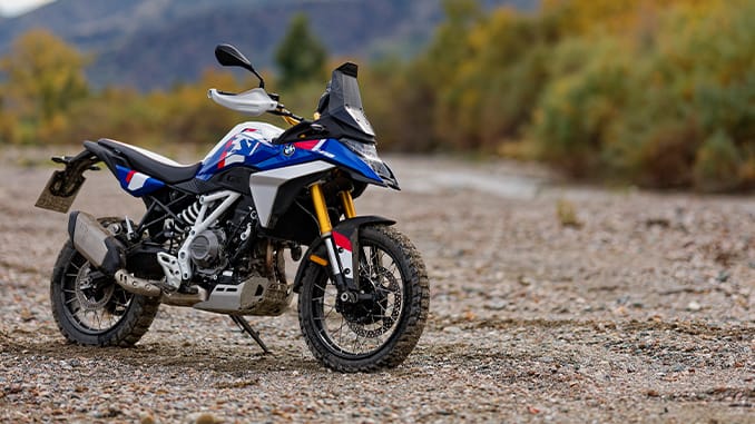 2027 BMW F 450 GS off-road motorcycle, front three-quarter studio shot