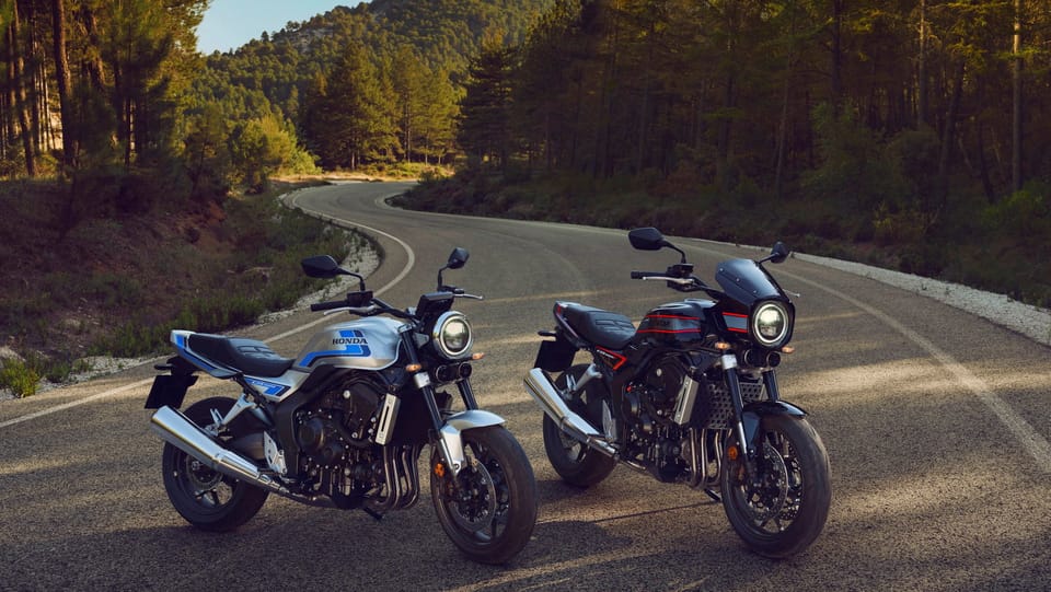 2026 Honda CB1000F in Wolf Silver Metallic with blue racing stripe, front three-quarter static shot