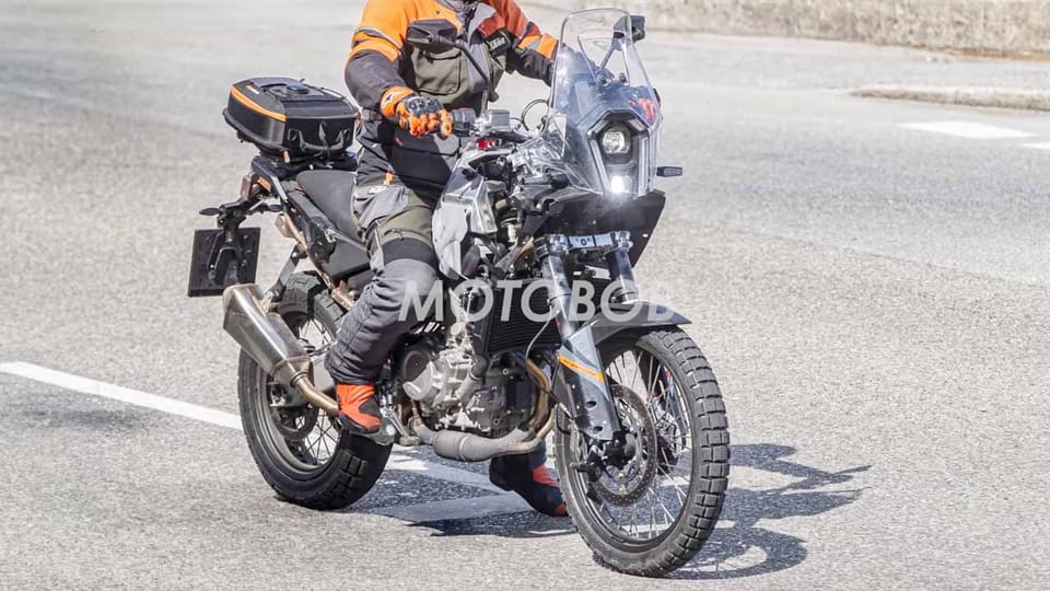 Camouflaged KTM 490 Duke prototype with parallel-twin engine, side view