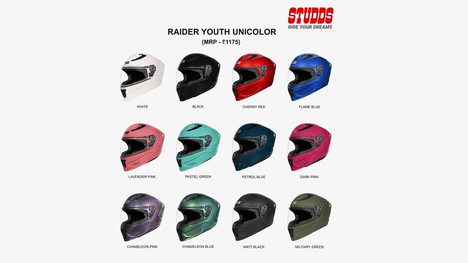 STUDDS Raider Youth full-face helmet in a bright colourway on display