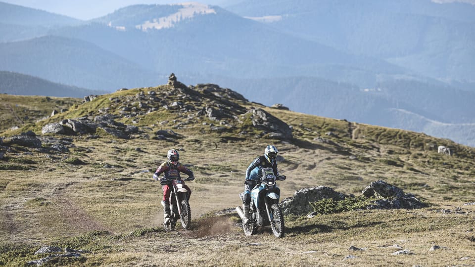 A hard enduro rider tackles a rocky mountain section during Red Bull Romaniacs in the Carpathian Mountains near Sibiu, Romania
