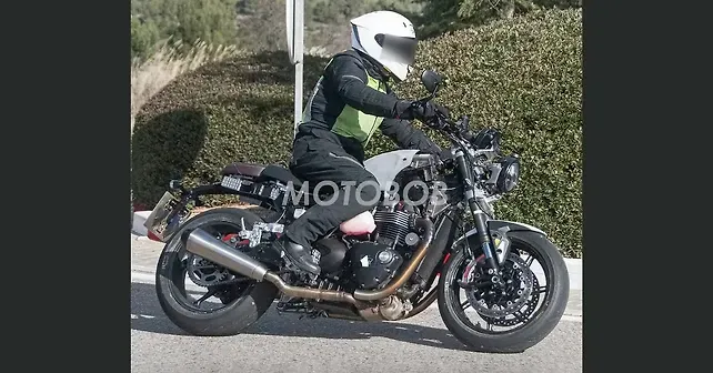 Triumph Speed Twin 1200, riding shot, three-quarter front view