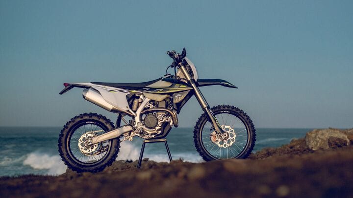 Triumph TF 450 competition dirt bike, side profile studio image