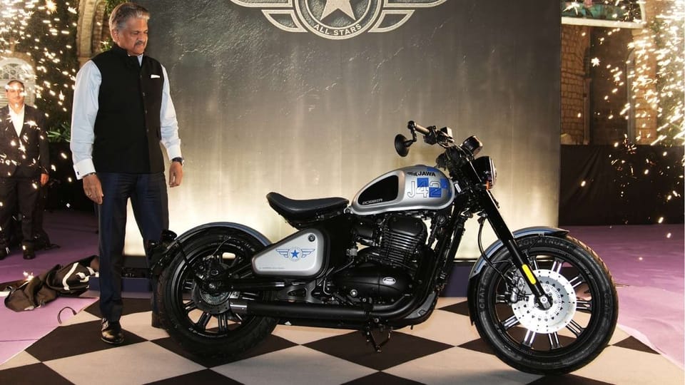 Jawa 42 Bobber All Stars in Mystic Copper with chequered flag graphics and All Stars insignia