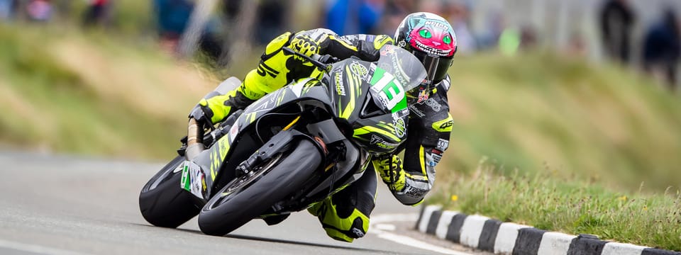 Isle of Man TT Mountain Course racing action, official TT Races banner image