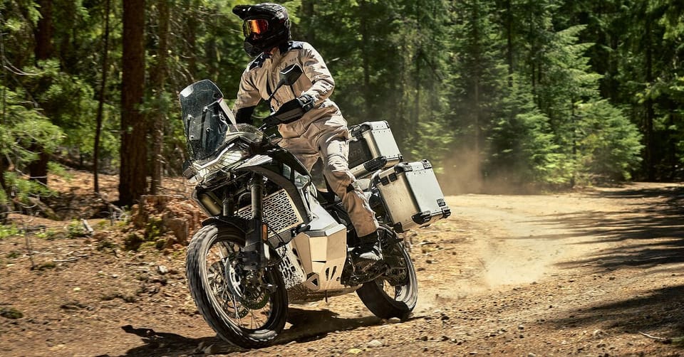 CFMoto Ibex 950 adventure motorcycle parked outdoors, front three-quarter angle